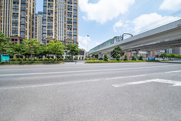 Fototapeta na wymiar Shenzhen urban architecture and empty urban traffic road surface