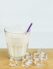 a glass of milk cocktail with ice