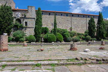 Castello di San Giusto historic fortress during touristic season. Sunny hot summer day.