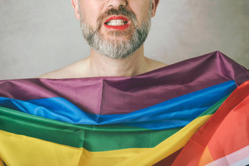 LGTB gay pride, Portrait of mature man with Rainbow flag gay pride movement LGBT 