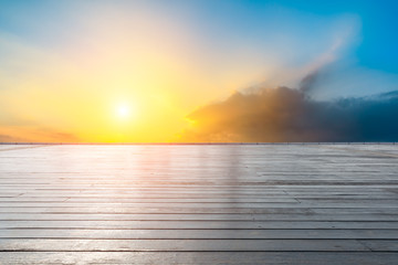 Wood square floor and beautiful sky at sunrise