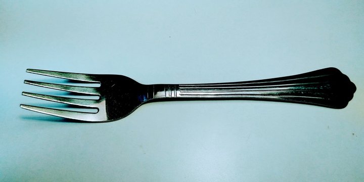 Stainless steel frok on white background