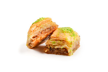 Pistachio baklava on a white background. Dessert.