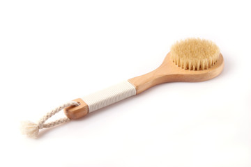 brush for dry massage on a white background isolated.