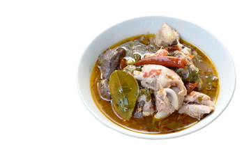 boiled chicken bone with herb and tamarind leaf Thai spicy soup on bowl
