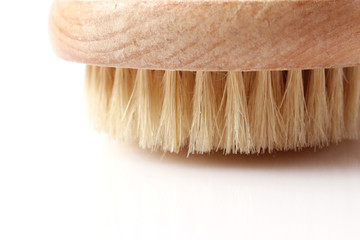 brush for dry massage on a white background isolated.