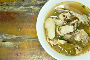 boiled duck bone with herb Thai spicy soup on bowl