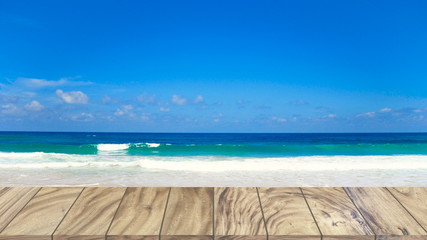Fototapeta na wymiar Wood table on beach sea background.
