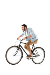 Fototapeta na wymiar angry bearded man screaming while riding bicycle isolated on white