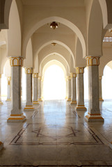 Beautiful arch, columns and marble floor. Architecture.