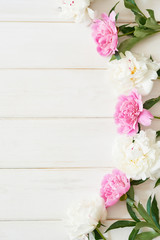 packaging template, layout of peonies on wooden white background