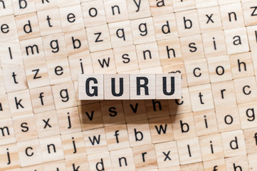 Guru word concept on cubes