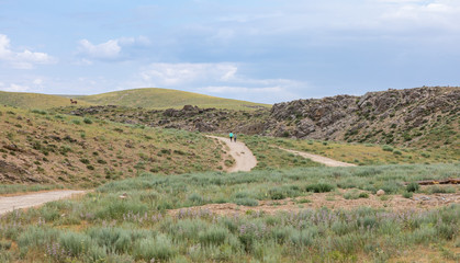 people go on the road with hills