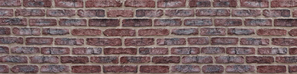 Wide red brick wall texture. Orange brickwork panoramic vintage background