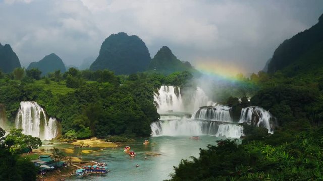 Bangioc waterfall in Vietnam and Detian waterfall in China, located near border, people can see this waterfall both of country. , Zoom out.