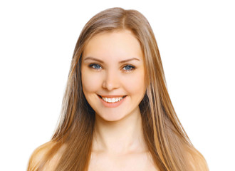 Naklejka premium portrait close-up beautiful young smiling woman with cute smile isolated on white bakground