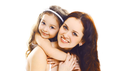 Portrait close-up happy smiling mother with her little child daughter isolated on white background