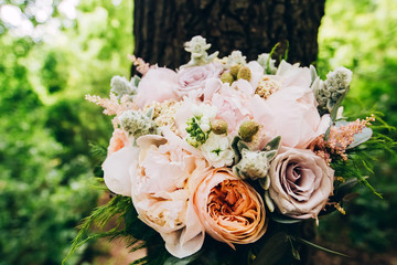 wedding bouquet with peony rose. bouquet with roses, peonies and eucalyptus.