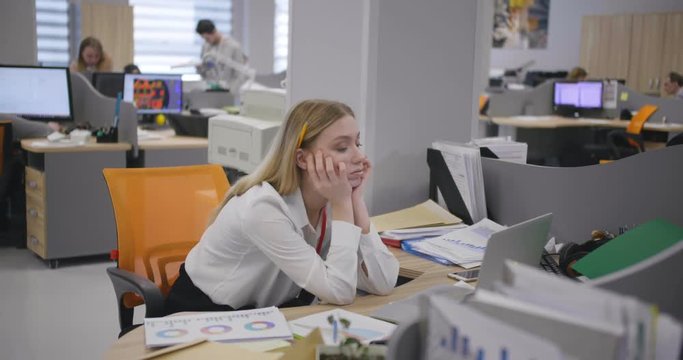 Woman napping at work