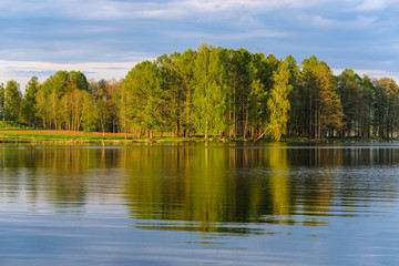 Fototapeta na wymiar landscape with the image of the sunrise over the lake Valdai