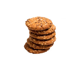Useful cookies with flax, sesame, sunflower seeds and roasted oat grains on white background.