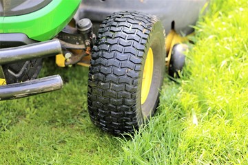 lawn mower on green grass