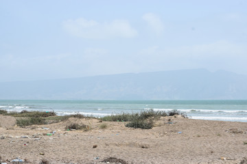 sand on beach sea water waves