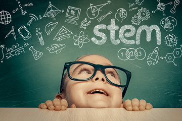 STEM word and doodles above beautiful cute little girl. modern education concept