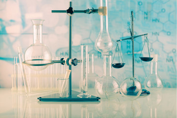 Chemical cabinet. Tripod with laboratory test tubes and flasks