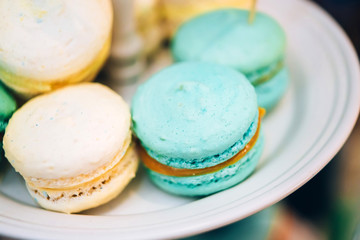 candy bar on the boy's birthday. Almond biscuits are blue and white. Macarons