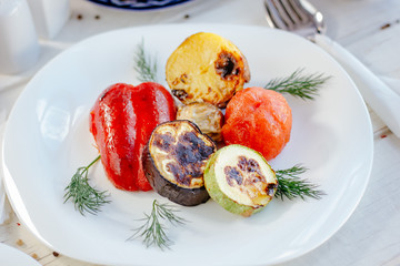 Grilled vegetables - tomatoes, potato, bell pepper, eggplant anc zuccini.