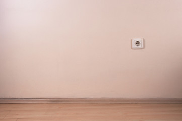 Electrical outlet, wall plug with copy space
