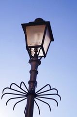 Fototapeta na wymiar Typical street lamp in a street of Salerno, Italy