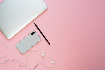 Laptop Phone Earphone Pink Minimal Top Flat Lay Copy Space. Smartphone and Pencil on Freelance...