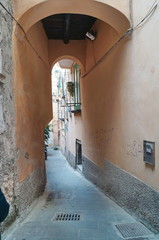 Typical alley in the center of Salerno at night Italy