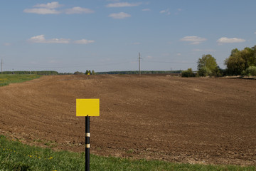 Plowed agricultural field prepared for planting crops in Siberia, Russia