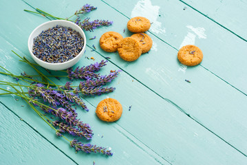cakes with lavender on aged blue wood table
