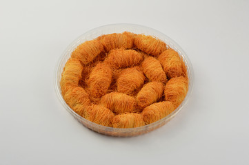 Turkish dessert kadayif, sweet food on white background