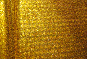 Gold colored square tile mosaic background