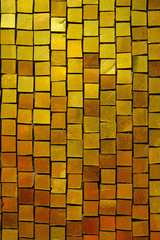 Gold colored square tile mosaic background