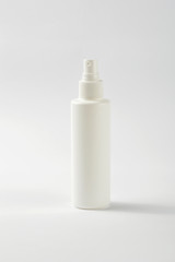 White plastic spray bottle isolated on white 