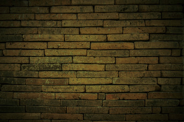 retro brick wall texture grunge background with vignetted corners to interior design
