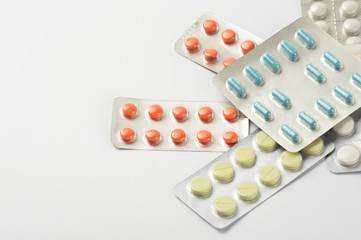Group of multi colored pills, capsule with copy space on white background 