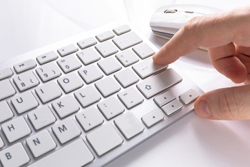 Pressing enter button on the computer keyboard