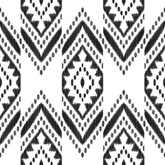 Chevron seamless pattern. Black and white textured background. Ethnic Ikat print. Vector illustration in modern aztec, navajo, boho style. Usable for textile, wallpaper, - 268829871