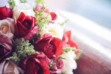 Beautiful rose Flowers bouquet on vintage chair in wedding ceremony. Valentine day