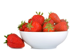 Ripe, delicious strawberries. red strawberry in white bowl on white isolated background