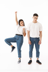 Fototapeta premium Full length portrait of a young attractive couple
