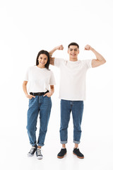 Obraz premium Full length portrait of a young attractive couple