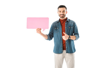 happy handsome man holding speech bubble and showing thumb up isolated on white